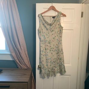 Cream colored dress with birds.